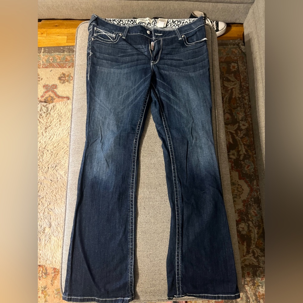 New Ariat jeans, I think I wore maybe twice before they were too big for me.
